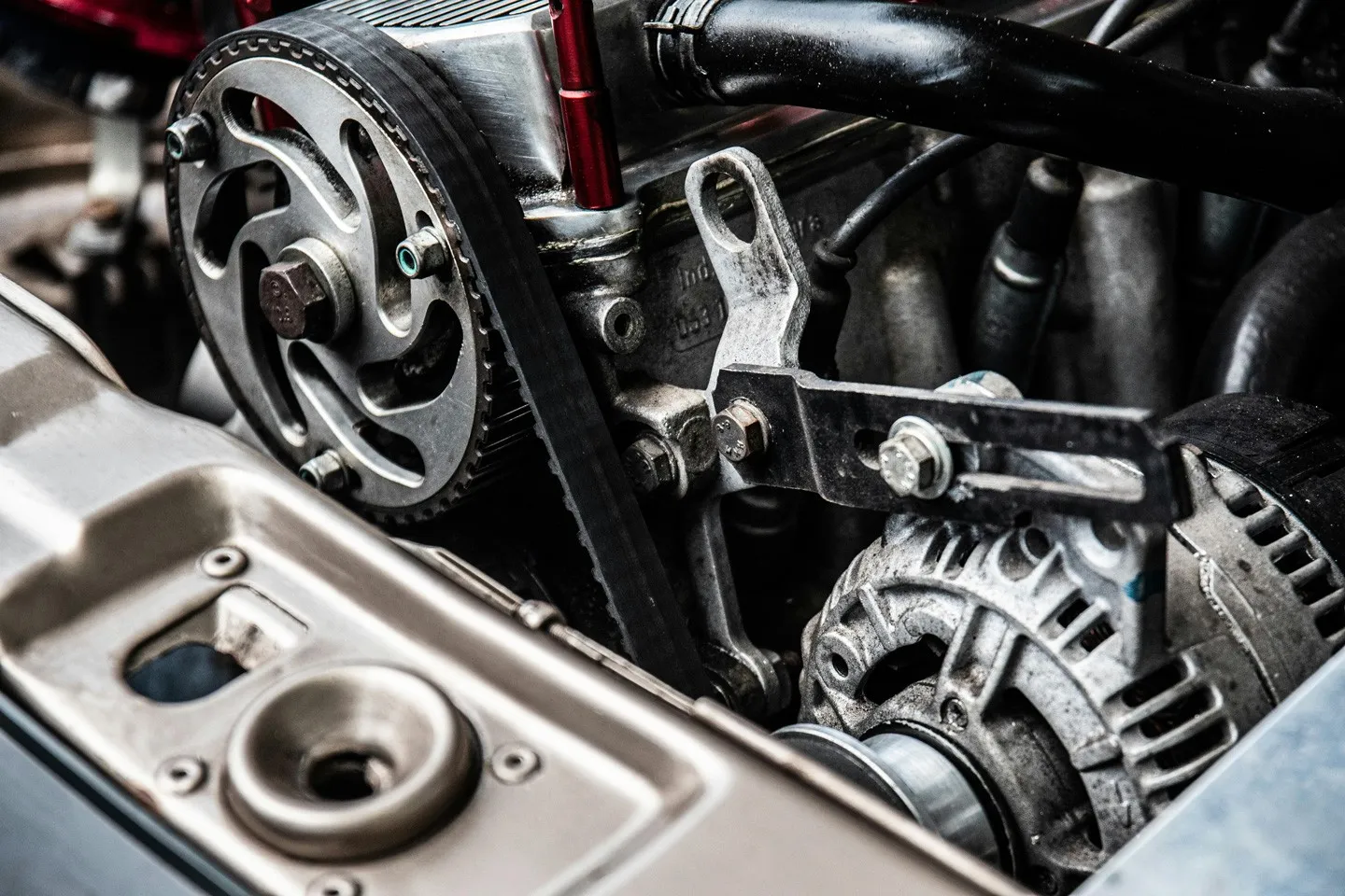 Close-up of an engine bay during a parts replacement