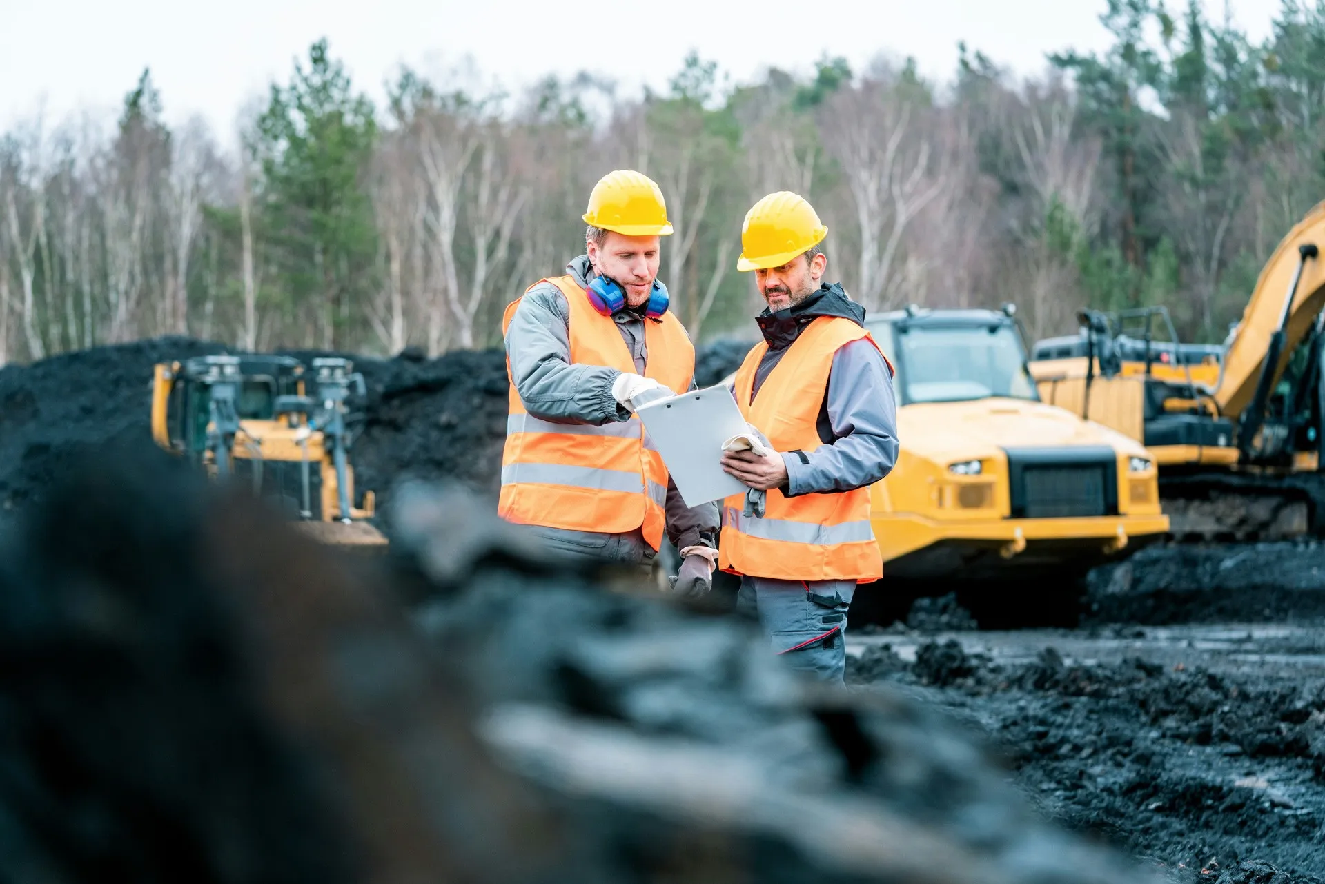 PlantFix engineers reviewing a service schedule on site